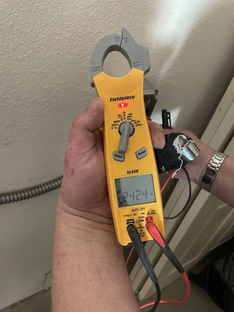 Voltage testing with clamp meter during Ceiling Fan Installation in Lower Windsor